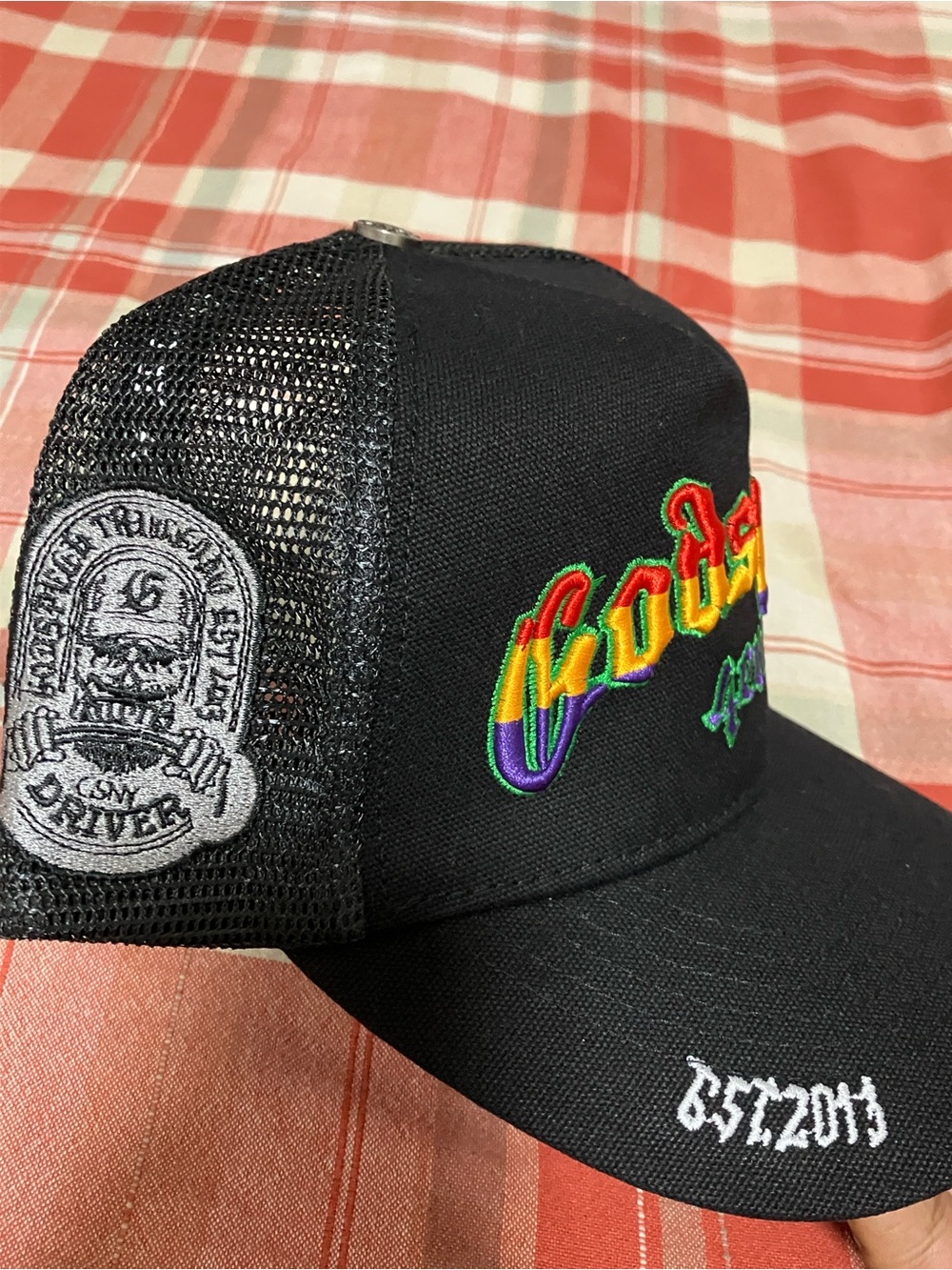 Love Black Mesh Trucker Hat with Rainbow Embroidered Logo